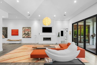 A single-story masterpiece unfolds in the prestigious Royal Palm - photo 13