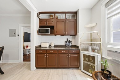 Welcome to this beautifully maintained detached two-family home - photo 14