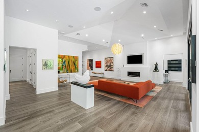 A single-story masterpiece unfolds in the prestigious Royal Palm - photo 14