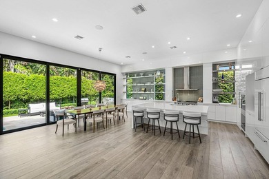 A single-story masterpiece unfolds in the prestigious Royal Palm - photo 15
