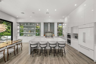 A single-story masterpiece unfolds in the prestigious Royal Palm - photo 16