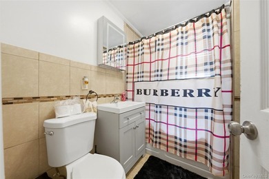 Welcome to this beautifully maintained detached two-family home - photo 18