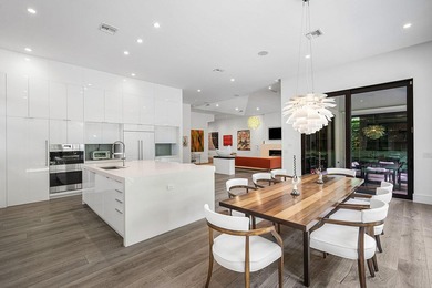 A single-story masterpiece unfolds in the prestigious Royal Palm - photo 19