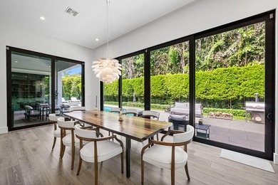A single-story masterpiece unfolds in the prestigious Royal Palm - photo 21