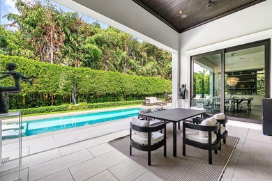 A single-story masterpiece unfolds in the prestigious Royal Palm - photo 22