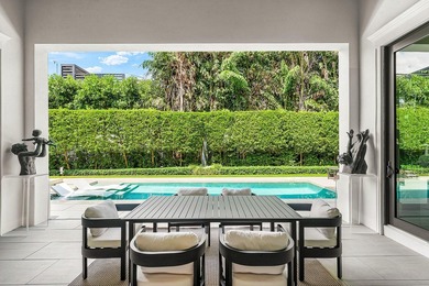 A single-story masterpiece unfolds in the prestigious Royal Palm - photo 23