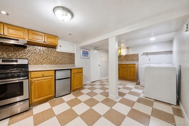 Welcome to this beautifully maintained detached two-family home - photo 27