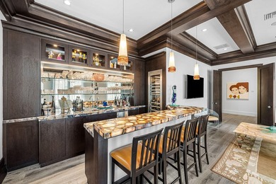 A single-story masterpiece unfolds in the prestigious Royal Palm - photo 34