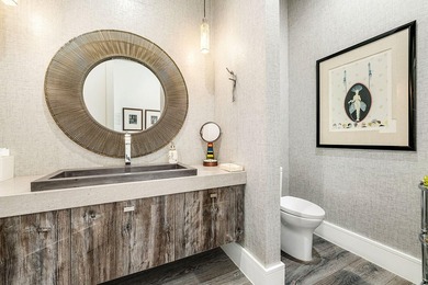 A single-story masterpiece unfolds in the prestigious Royal Palm - photo 35
