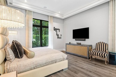 A single-story masterpiece unfolds in the prestigious Royal Palm - photo 37