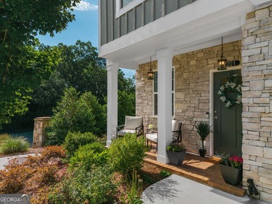 Welcome to Lakeside Garden, a truly one-of-a-kind townhome in - photo 2