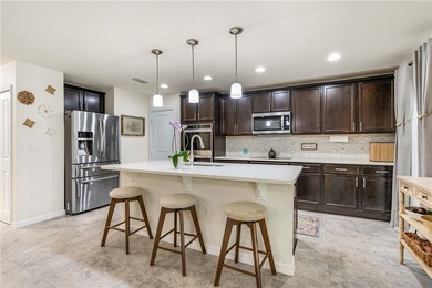 Nestled against a serene Florida preserve, this home features a - photo 3