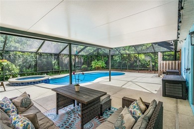 Nestled against a serene Florida preserve, this home features a - photo 4
