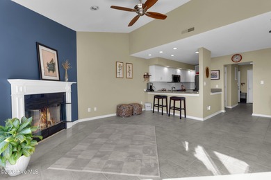 Enjoy the best of coastal living with water views of the Neuse