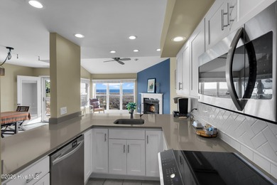 Enjoy the best of coastal living with water views of the Neuse