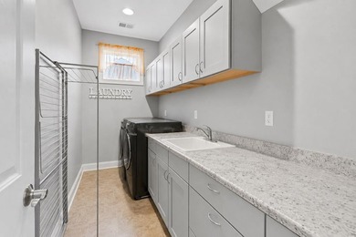 Experience elevated lakefront living in this exceptional custom - photo 18