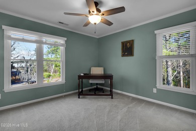 Enjoy the best of coastal living with water views of the Neuse