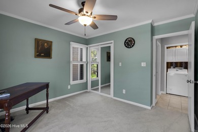 Enjoy the best of coastal living with water views of the Neuse