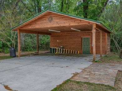 Nestled on over 17 acres this charming log home offers the - photo 4