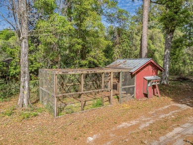 Nestled on over 17 acres this charming log home offers the - photo 10