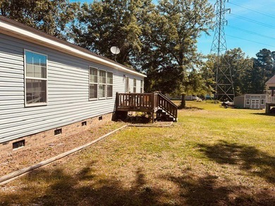 Welcome to this inviting single-level home perfectly positioned - photo 12