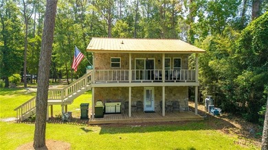 (private lake, pond, coastal) Home For Sale in Summerdale Alabama