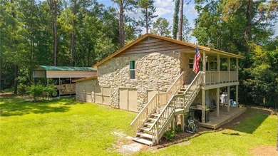 RIVER RETREAT! Over 1.2 acres! New real stone exterior! Whether - photo 2