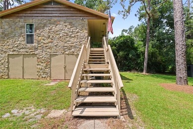 RIVER RETREAT! Over 1.2 acres! New real stone exterior! Whether - photo 3