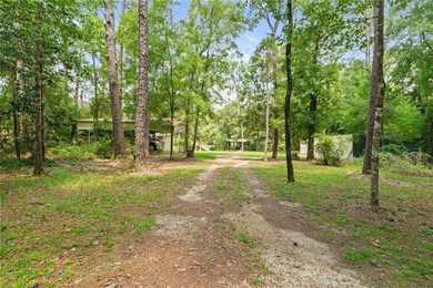 RIVER RETREAT! Over 1.2 acres! New real stone exterior! Whether - photo 8