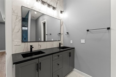 Positioned on 1.5 acres in a gated waterfront community designed - photo 11
