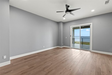Positioned on 1.5 acres in a gated waterfront community designed - photo 25