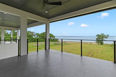 Positioned on 1.5 acres in a gated waterfront community designed - photo 26