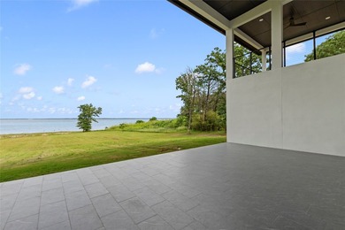 Positioned on 1.5 acres in a gated waterfront community designed - photo 32