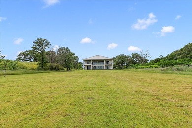 Positioned on 1.5 acres in a gated waterfront community designed - photo 36