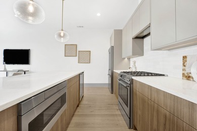 Welcome to 1548 W Ardmore, a stunning new development in the