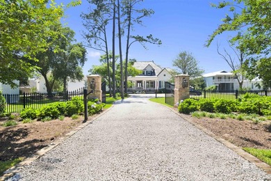 With 114' feet of waterfront on the Mobile Bay, this bay front - photo 9