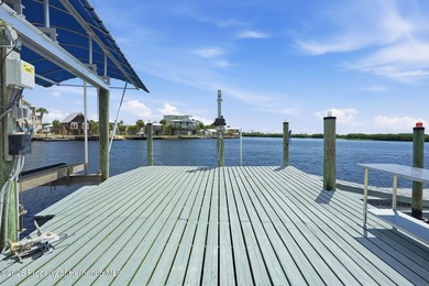 Waterfront luxury meets coastal convenience in this exceptional - photo 49