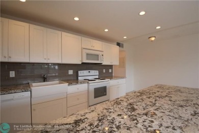 Lake Condo For Sale in Coconut Creek, Florida