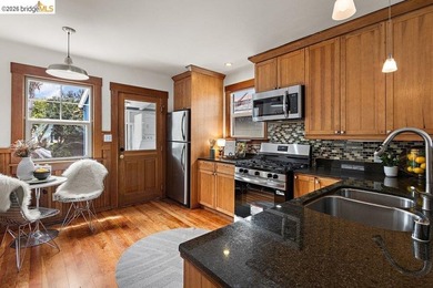 This exceptional 1927 early century cottage presents an - photo 12