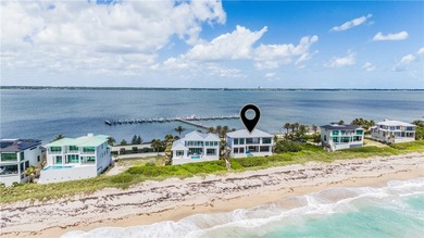 Newly constructed directly on the Atlantic, this home sets a new - photo 2