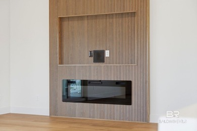Newly completed in 2026, this stunning corner-lot beach home - photo 9