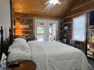 Enjoy lakeside living in this cozy yet upgraded 2nd-story log - photo 16