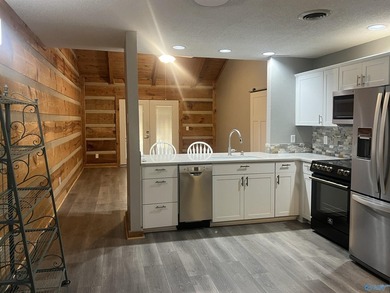 Enjoy lakeside living in this cozy yet upgraded 2nd-story log - photo 28