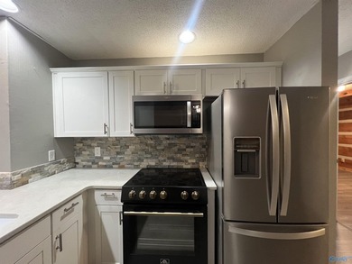 Enjoy lakeside living in this cozy yet upgraded 2nd-story log - photo 30