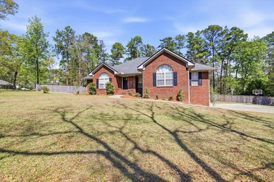 Welcome to this picture-perfect, corner lot brick beauty, in the - photo 3