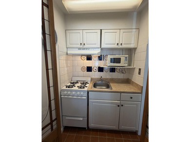 Welcome to Unit 106 at 132 S. Providence Avenue, a charming and - photo 11