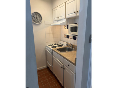 Welcome to Unit 106 at 132 S. Providence Avenue, a charming and - photo 14