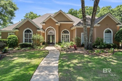 Nestled among mature trees and overlooking the 9th fairway, this - photo 1