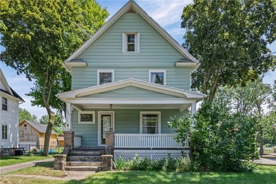 Discover the timeless charm of this 1900s home, rich with - photo 2
