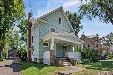 Discover the timeless charm of this 1900s home, rich with - photo 3